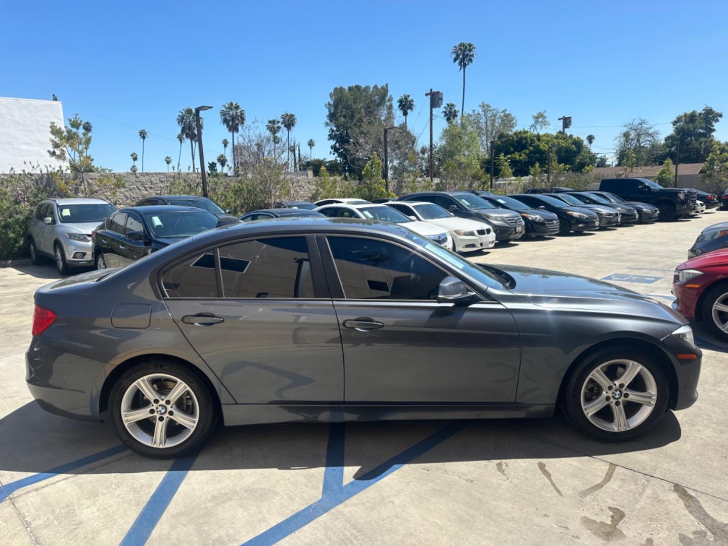 2014 Gray /Black BMW 3-Series leather (WBA3B1C52EK) with an 4 Cylinder engine, Automatic transmission, located at 30 S. Berkeley Avenue, Pasadena, CA, 91107, (626) 248-7567, 34.145447, -118.109398 - Moon-roof! Premium package! this 2014 BMW 3-Series 320i Sedan looks and drives well. Looking for a reliable and stylish vehicle in Pasadena, CA? Look no further! We have this sleek 2014 BMW 3-Series 320i Sedan available at our dealership. Whether you have perfect credit or are concerned about your c - Photo#5